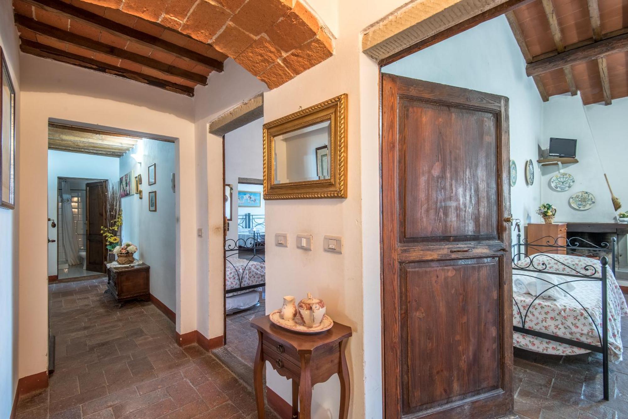 Poggio Primo - Bilocale Brando Villa กาสติลิออน ฟิบอคคี ภายนอก รูปภาพ